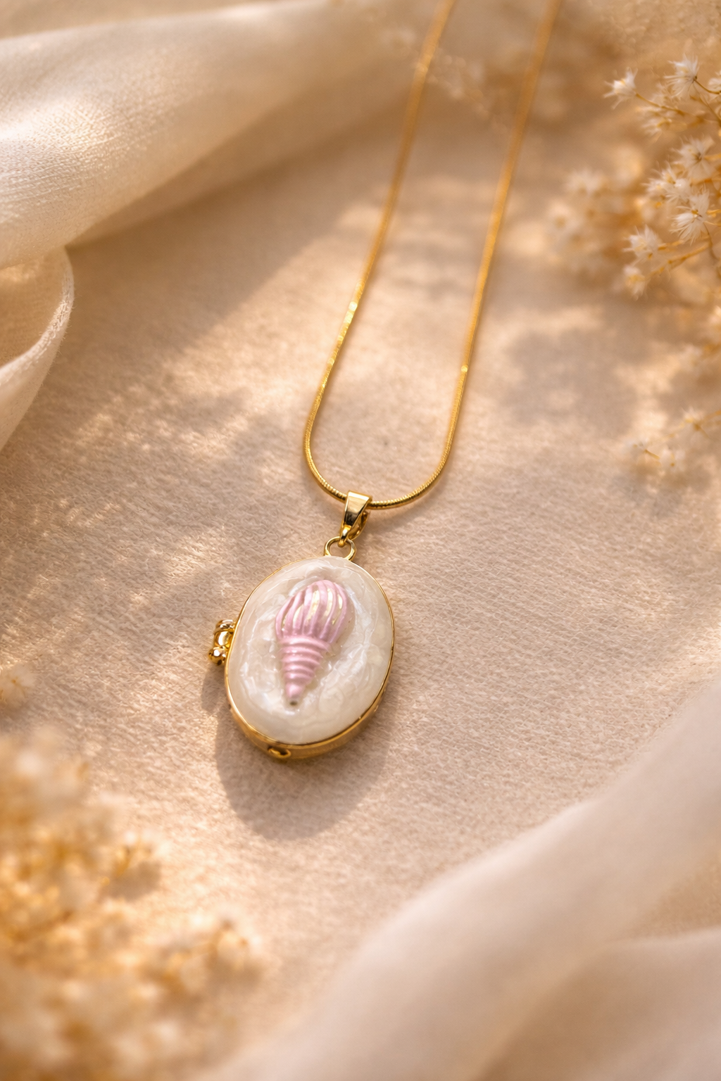 Blush seashell locket