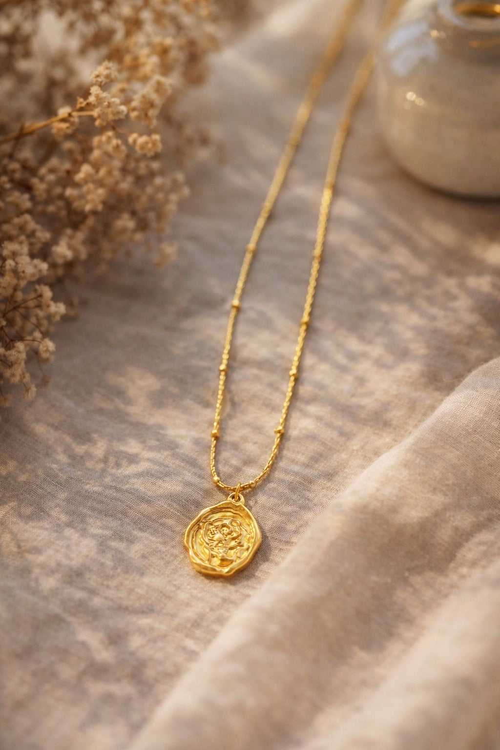 Golden Rose Seal Pendant